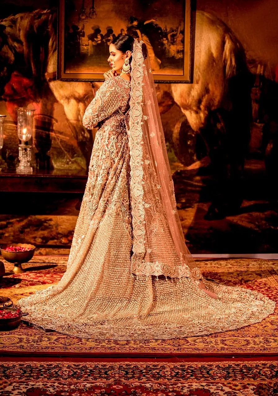 Dusty pink Trail Net Jacket Lehenga Set.