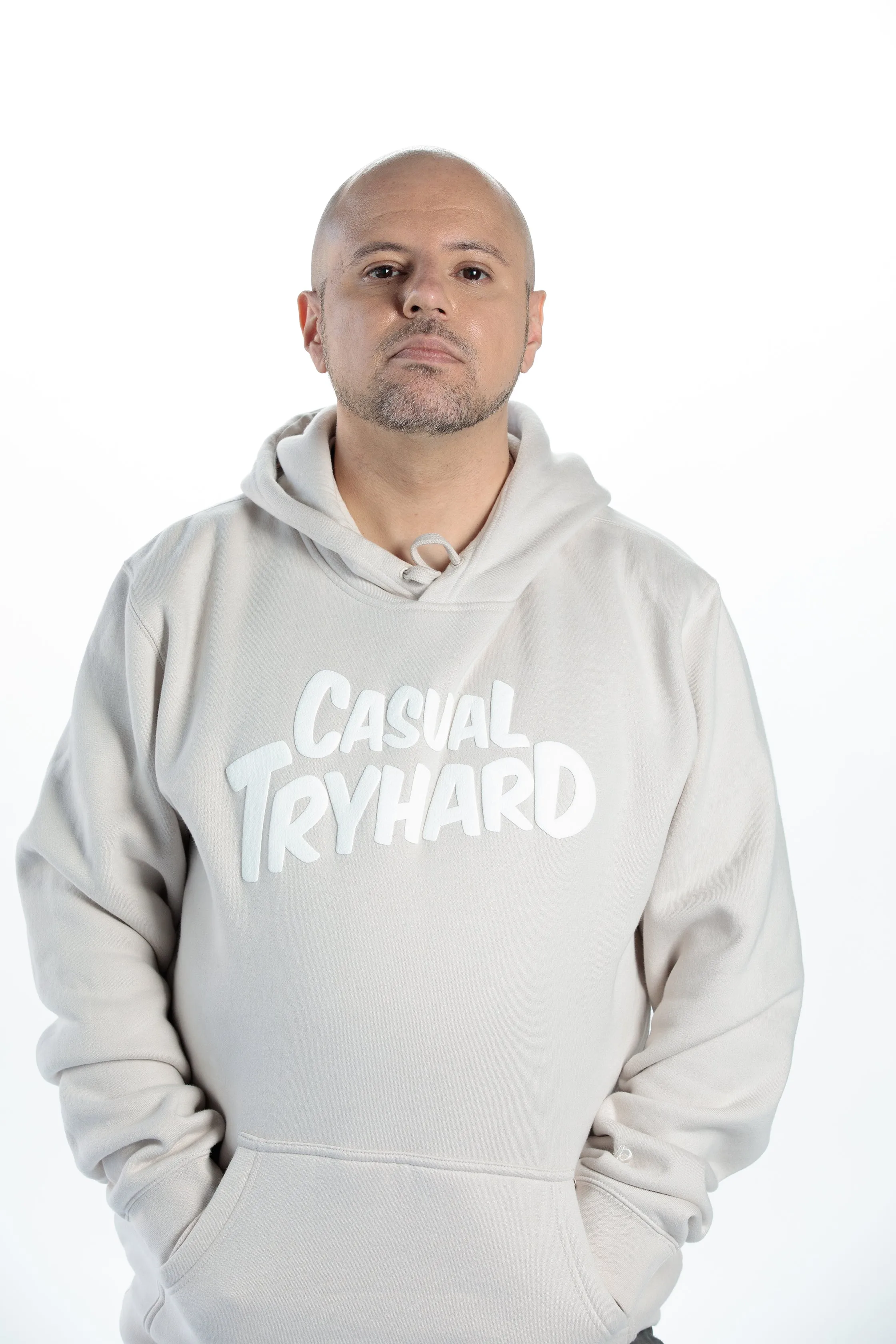 JUSTIN WONG - 'Casual Tryhard' Premium Puff Print Hoodie - Sand