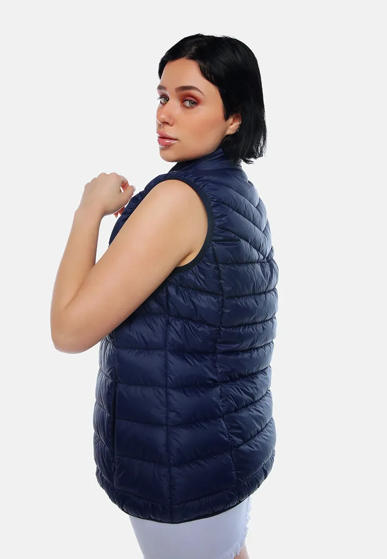 Sleeveless Puffer Jacket In Tangerine