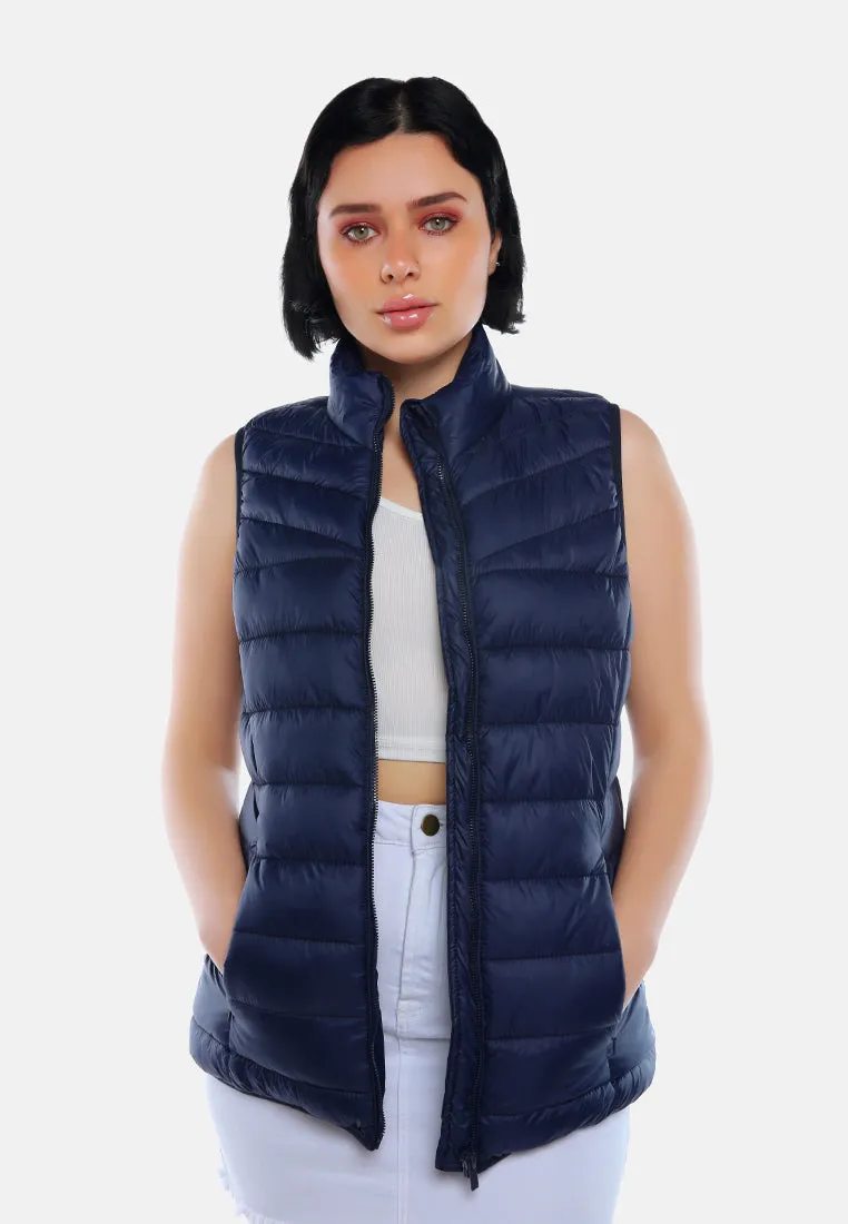 Sleeveless Puffer Jacket In Tangerine